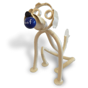 Cream-colored metal dog sculpture with blue ball nose labeled "woof"