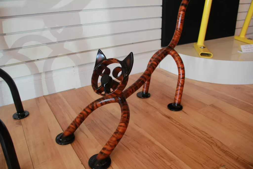 Stretching Cat Pipe Art in Sarasota